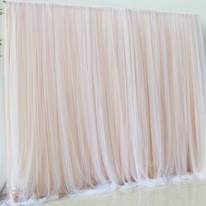 Champagne/blush backdrop with poles